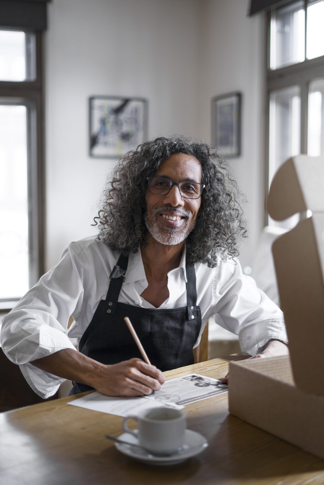 Business owner reviewing invoices